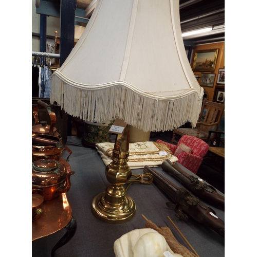 351 - An ornate brass table lamp