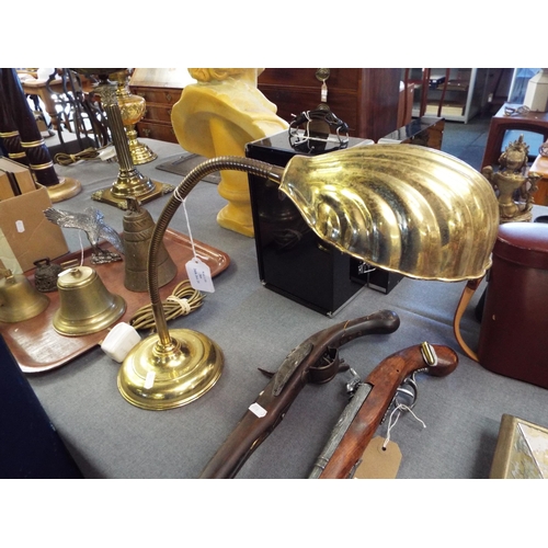 366 - A vintage brass adjustable shell shaped reading lamp