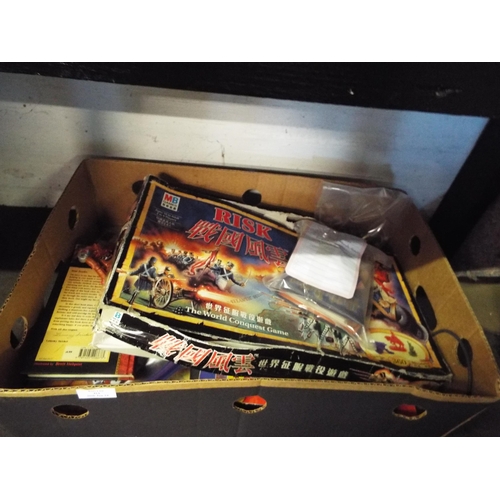 414 - A box of assorted games, puzzles, Harry Potter collector's cards etc