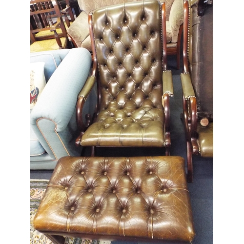 476 - A green leather button back and studwork chair with scroll arms and similar footstool