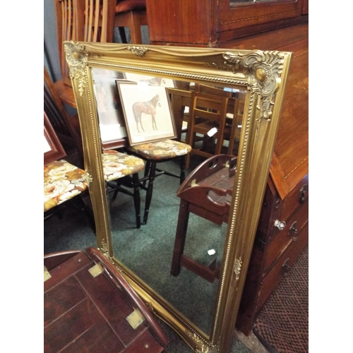 505 - A gilt framed bevel glass mirror