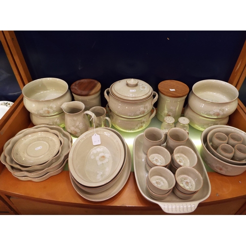 51 - A selection of Denby 'Daybreak' table-ware to include tureens, storage jars, mugs, egg cups, cassero... 