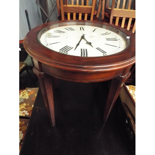 515 - A stained wood circular clock inset side table