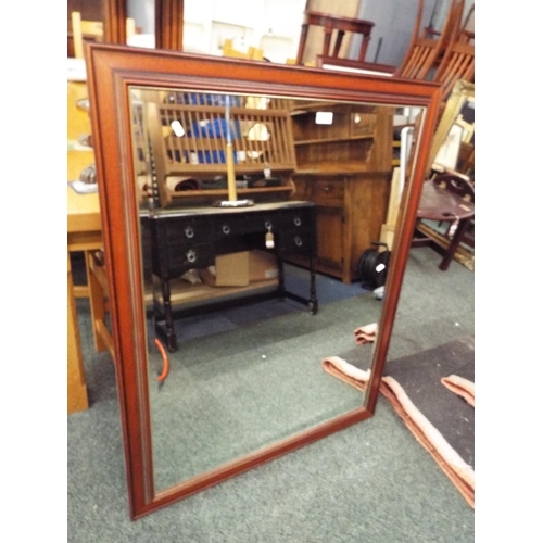 517 - A wooden framed bevel glass mirror