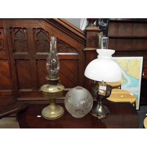 519 - Two vintage oil lamps