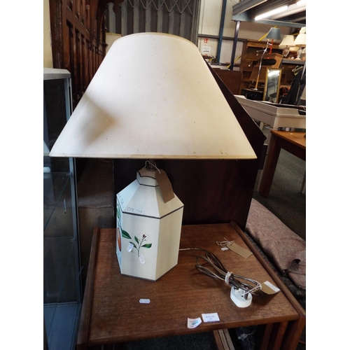 526 - A tin caddy table lamp and shade