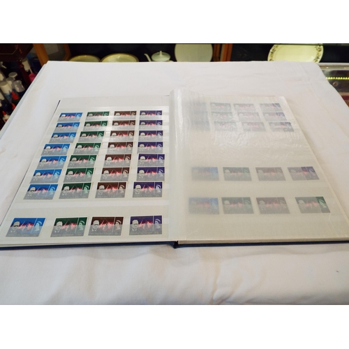 67 - An album housing a selection of Great Britian and Commonwealth mint stamps to include 'Seychelles', ... 