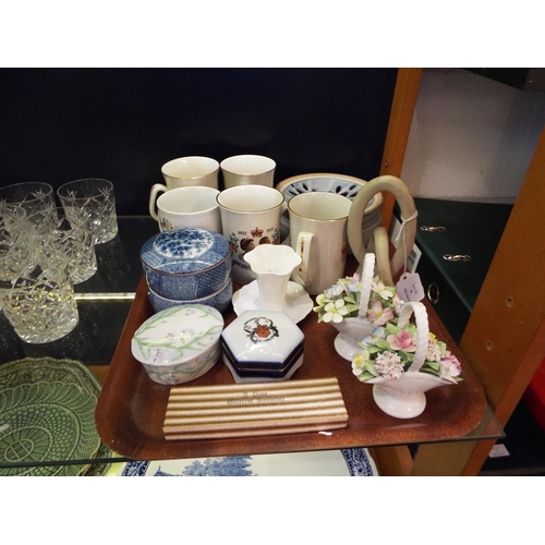 99 - A mixed selection of assorted china to include Royal Doulton posy baskets, lidded pots, commemorativ... 