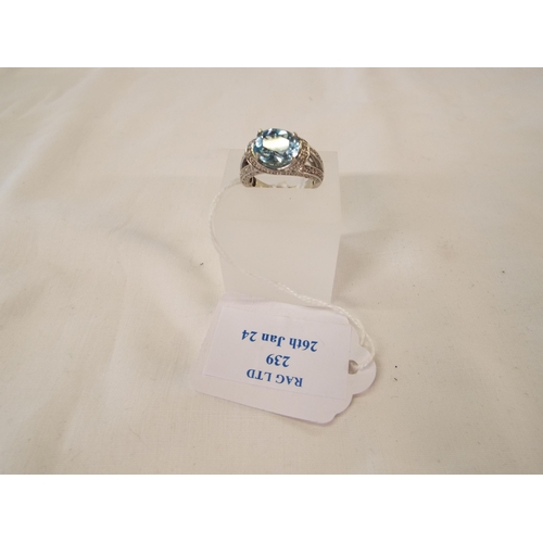 239 - A white metal blue diamond gemstone ring, size O