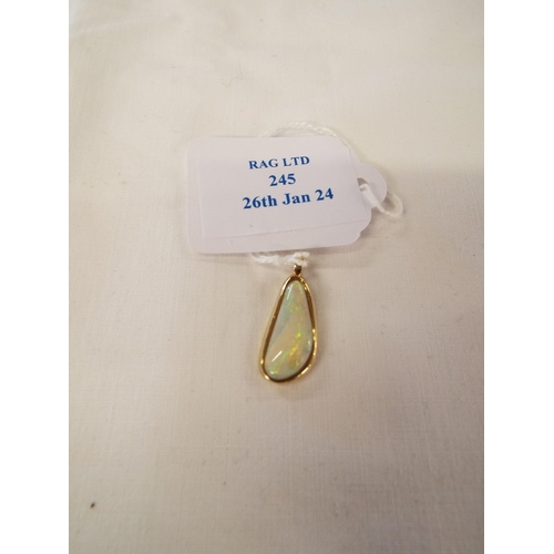 245 - A 14ct gold pendant inset with opal