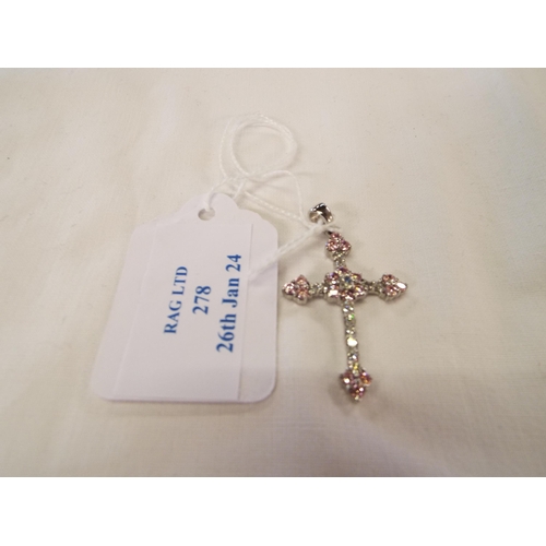 278 - A 9ct white gold cross pendant inset with pink and clear stones