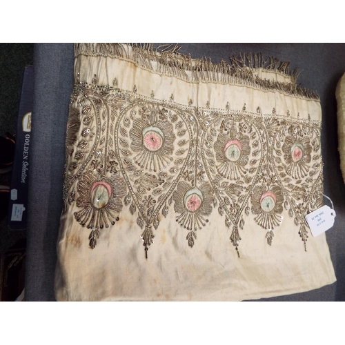 350 - A Middle Eastern silk panel with silver thread and stylised decoration