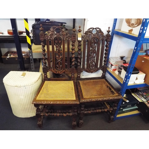 401 - A pair of Jacobean carved oak hall chairs, one A/F