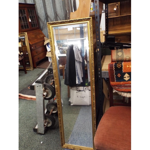 493 - A gilt framed oblong bevel glass mirror