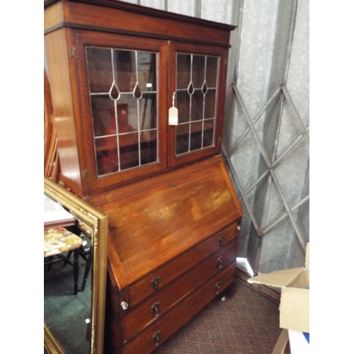 504 - An Edwardian mahogany boxwood strung bureau bookcase A/F