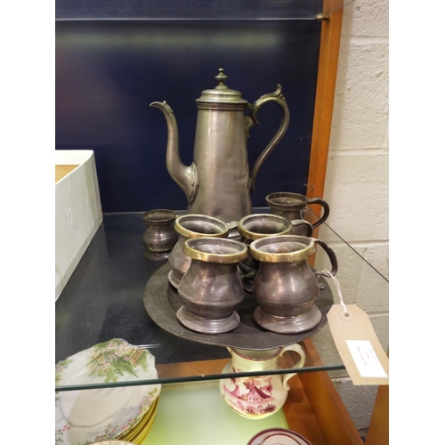 126 - A selection of pewter to include plate, tankards, teapot