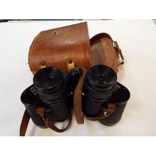 149 - A pair of Farview 8x30 Field 6.5 binoculars housed in a leather case