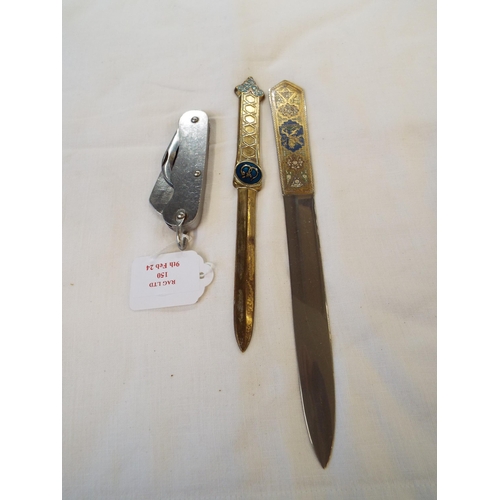 150 - A vintage military pen knife and two brass letter openers