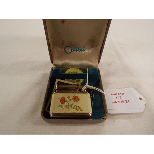 177 - A vintage enamel Calibri Monopol enamel lighter having floral decoration