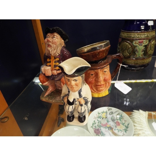 22 - A Tony Wood character jug, a Melba Ware character jug and another