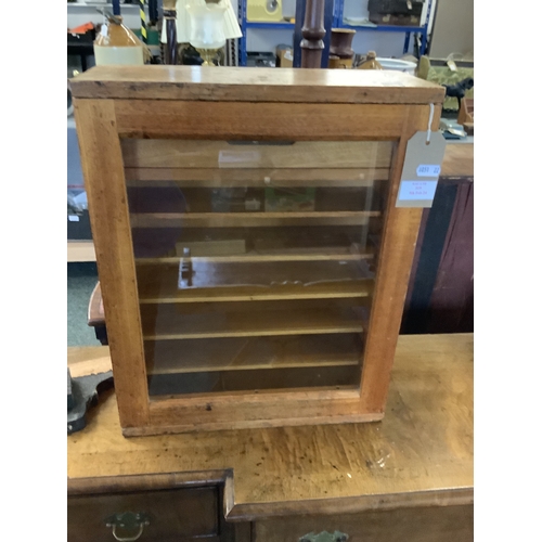 519 - A glass fronted laboratory cabinet with drawer and shelves under