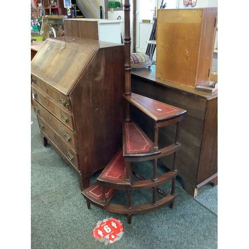 528 - A set of mahogany spiral library steps with red leather treads