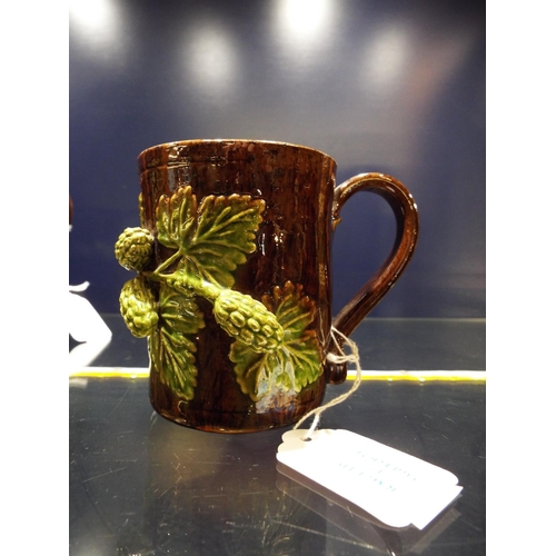 17 - A circa 1900s Rye Pottery brown glazed jug with applied hops and vine 3 3/4