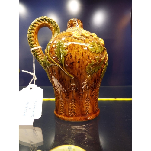 2 - A circa 1880s brown glazed Rye Pottery ewer with sprigged oak leaf and flower heads, the looping han... 