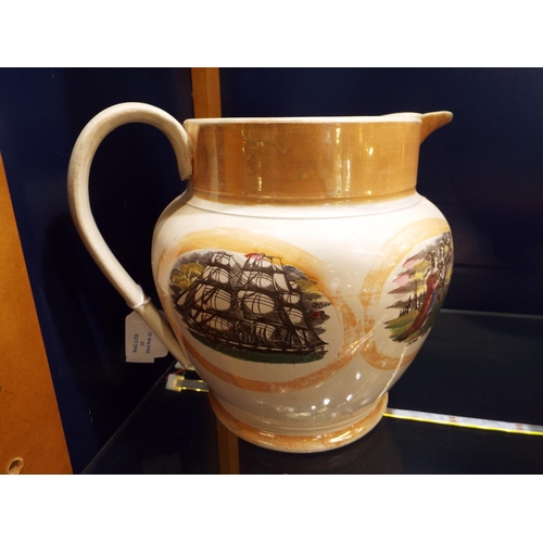 23 - A large Sunderland amber lustre water jug with pictorial panels and verse 9