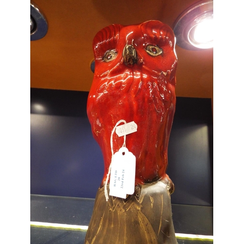 28 - A David Sharp red glazed owl on tree stump signed to base 11