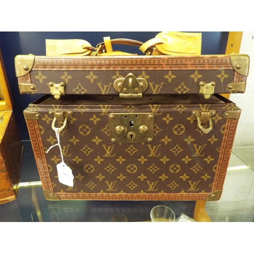 38 - A Louis Vuitton trunk vanity case with three leather labels, internal mirrored case is missing