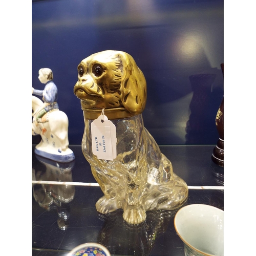 53 - A glass and brass figure of a pug dog decanter (lid A/F)