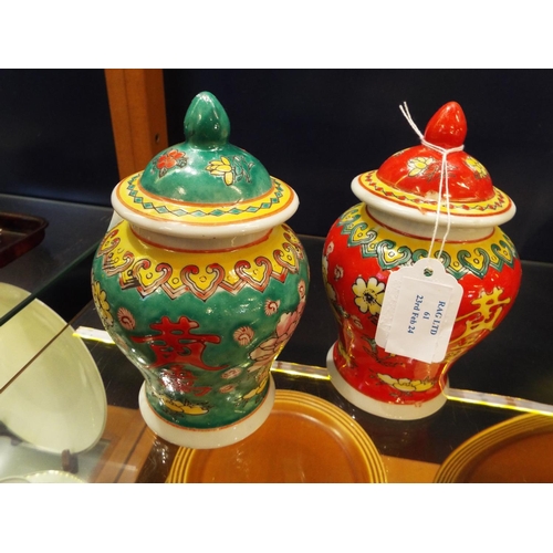 61 - A pair of Chinese ginger jars with floral decoration red seal marks to base 6 1/2