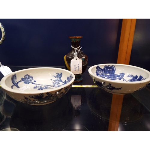 67 - A pair of Oriental blue and white china bowls together with a cloisonné vase with dragons chasing a ... 