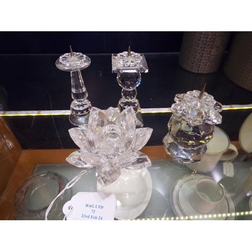 72 - A Swarovski candle holder and three pricket candle holders