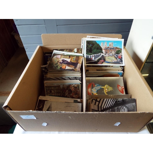 108 - A large box of vintage postcards to include Sussex, Kent and London topographical, architectural and... 