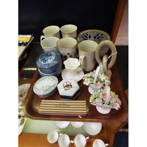 119 - A mixed selection of assorted china to include Royal Doulton posy baskets, lidded pots, commemorativ... 