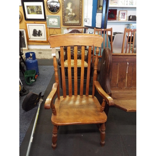 443 - A vintage beech carver chair