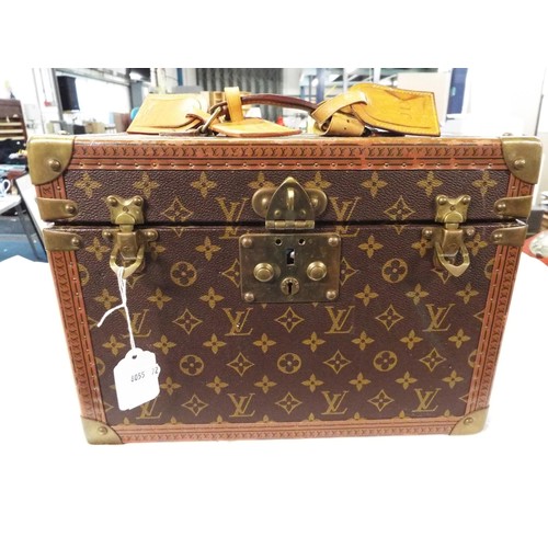 38 - A Louis Vuitton trunk vanity case with three leather labels, internal mirrored case is missing