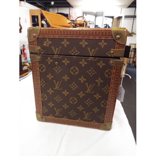 38 - A Louis Vuitton trunk vanity case with three leather labels, internal mirrored case is missing