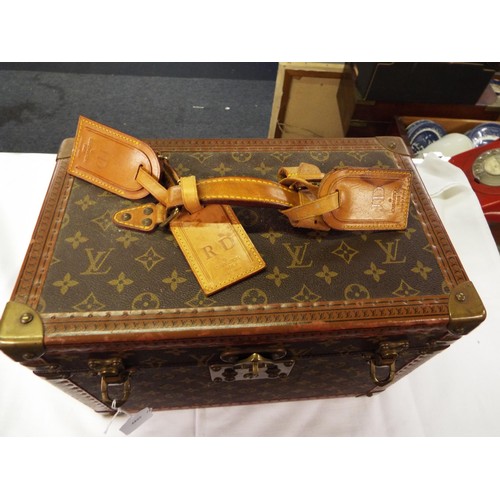 38 - A Louis Vuitton trunk vanity case with three leather labels, internal mirrored case is missing