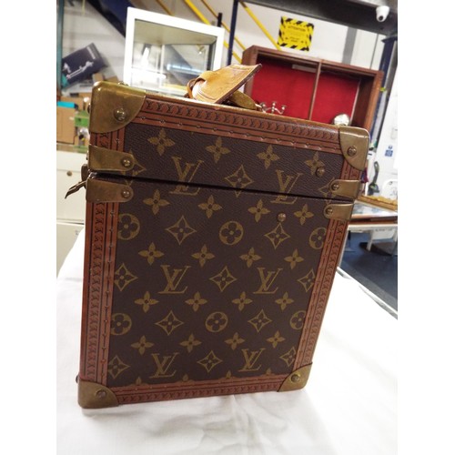 38 - A Louis Vuitton trunk vanity case with three leather labels, internal mirrored case is missing