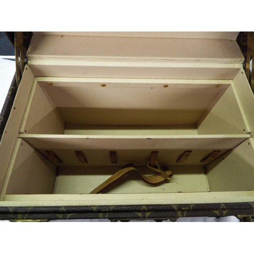 38 - A Louis Vuitton trunk vanity case with three leather labels, internal mirrored case is missing