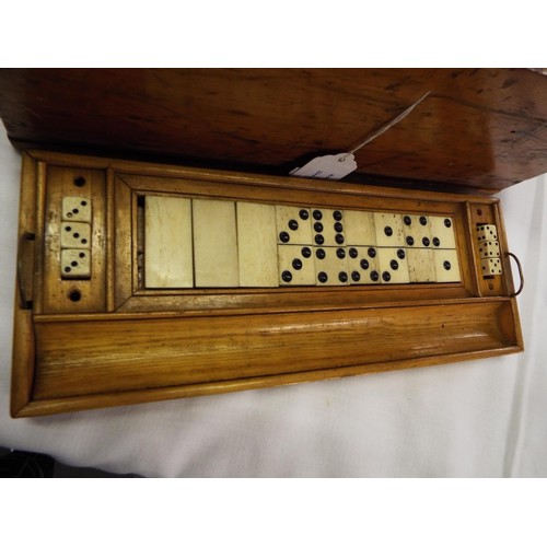 39 - A mid Victorian 'Golden Oak' Royal Cabinet of Games and Games Compendium the hinged lid and frontage... 