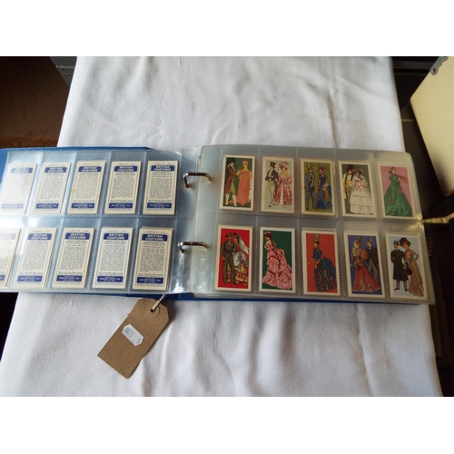 112 - An album of mainly sets of Brooke Bond tea cards to include Famous People, Costumes, Animals, Fish e... 