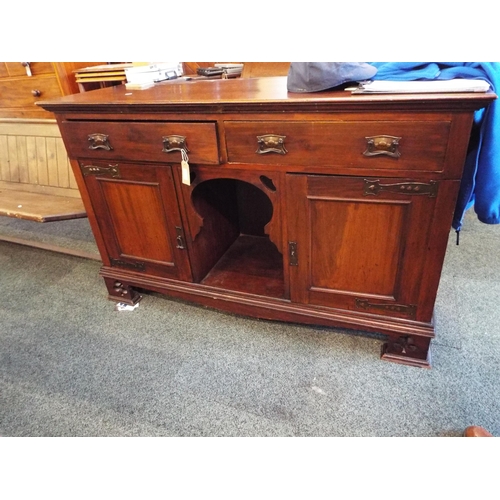 531 - An Arts & Crafts mahogany sideboard with two drawers and cupboards under