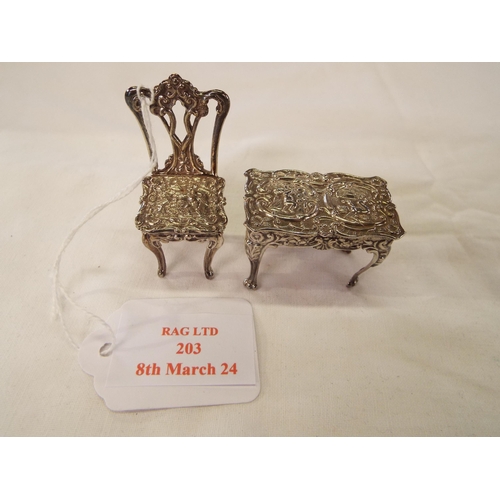 203 - A Samuel Morden & Co miniature dolls house table and chair
