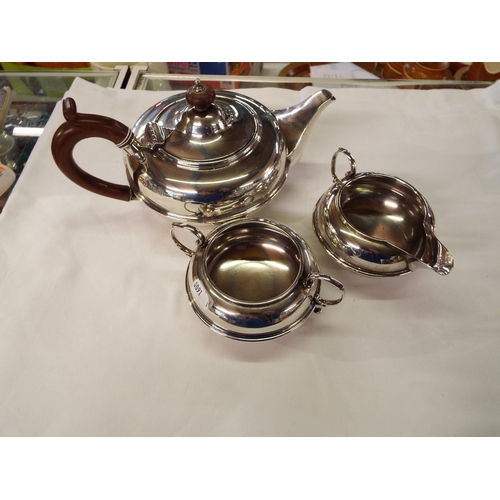 207 - A Birmingham silver 1925 silver tea-set comprising of tea-pot sugar bowl and cream jug weighing 28 t... 