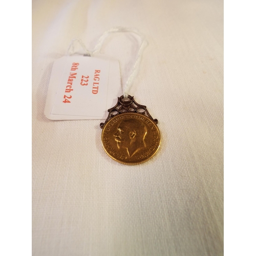 223 - A 1913 gold sovereign with applied mount