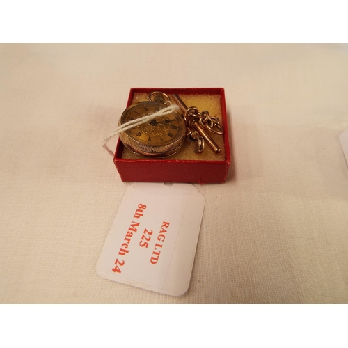 225 - A 9ct gold ladies fob watch with 9ct gold T bar and small albert chain 7.74 gms